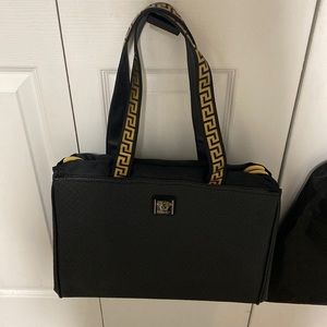 Black Versace bag includes dust bag never used